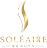 Gold logo of Soléaire Beauty on a black background